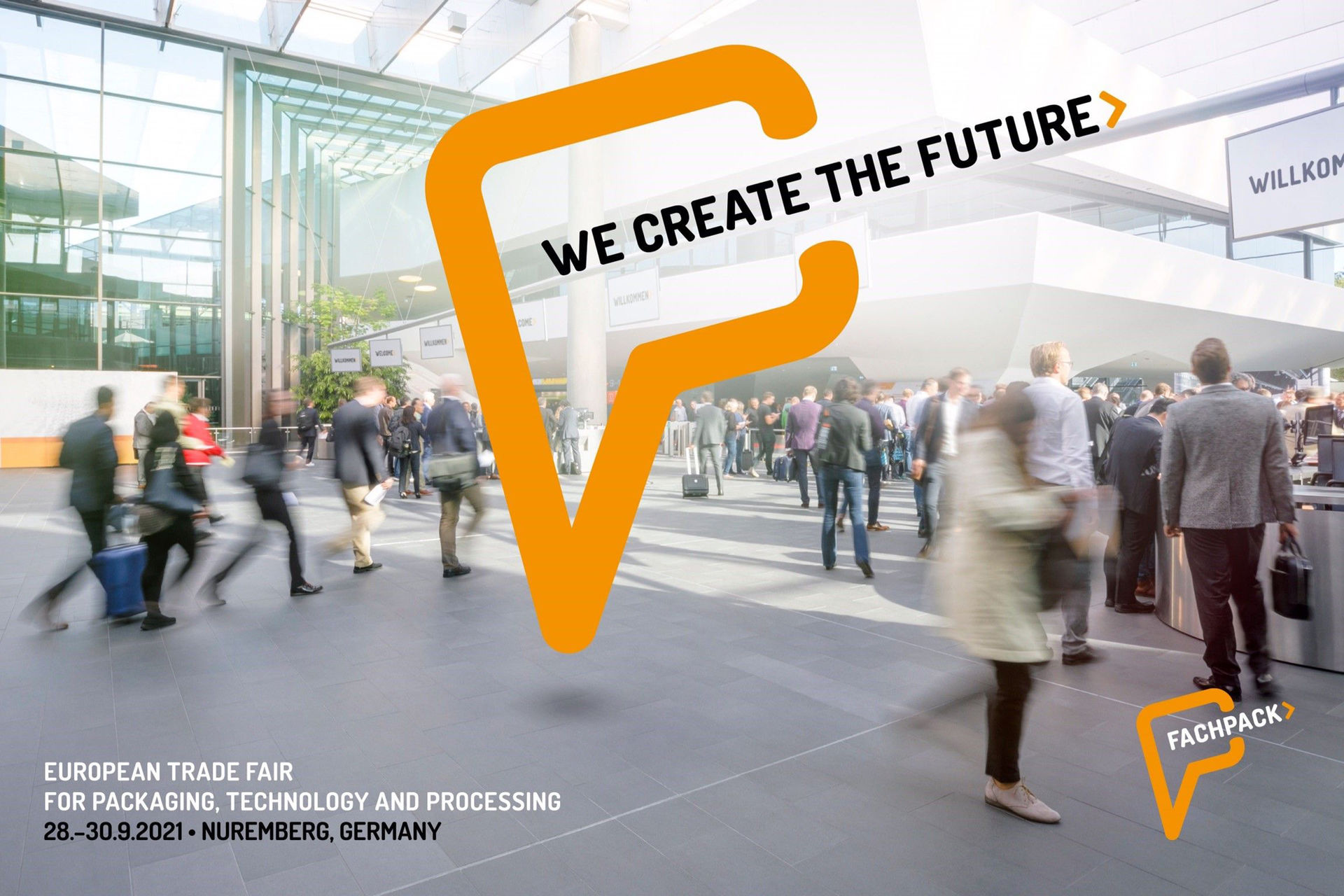 Der orange PackPin mit dem Slogan „Wir machen Zukunft“ ist das neue Logo der FACHPACK